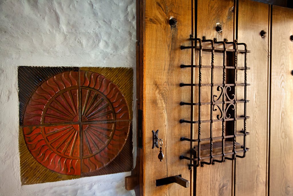 Entrance to beechnut Cottage at Heath Farm Holiday Cottages. Ornate hand crafted ironwork made by local craftsmen